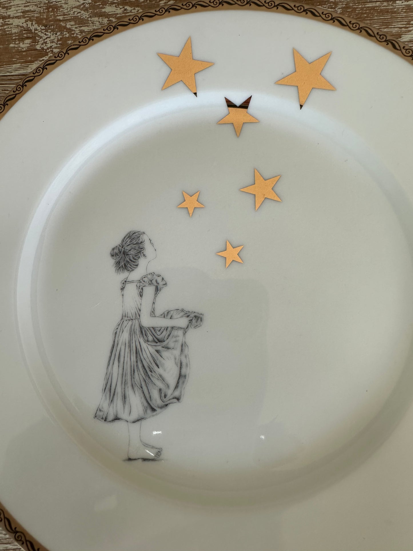 Teller Sternentaler klein mit Goldrand